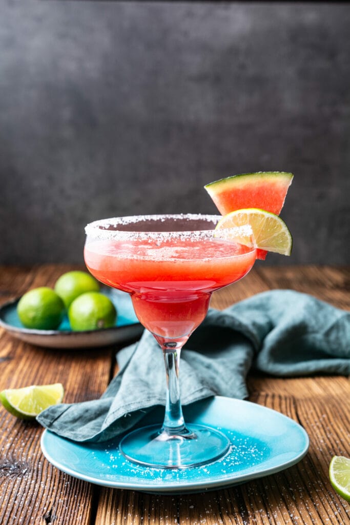 Watermelon Margarita cocktail in a glass shot from the side